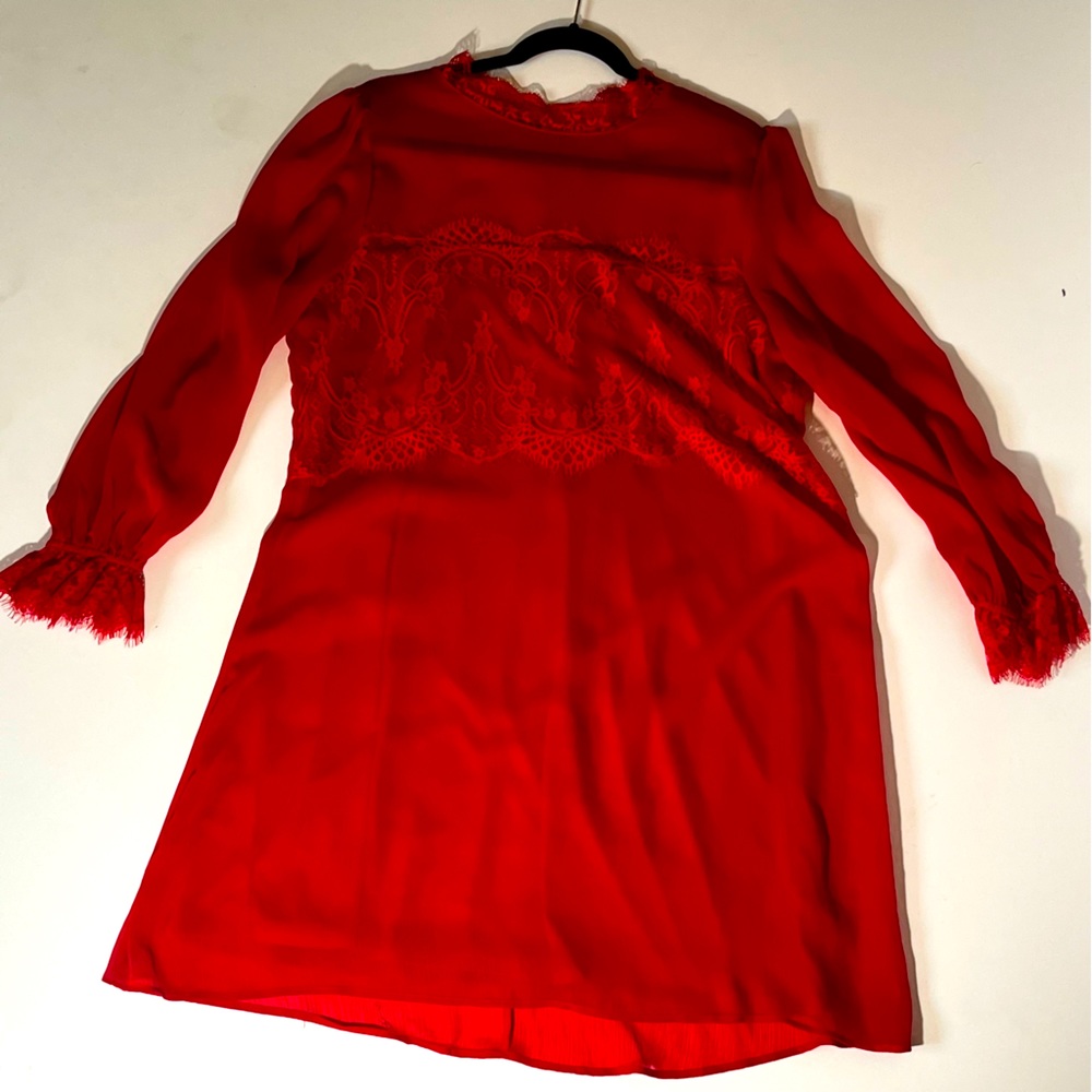 Red, long sleeve with lace accents dress. Knee length.